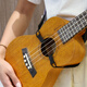 爱帛哆（AIBODUO）尤克里里背带免打孔ukulele乌克丽丽背带斜跨小吉他肩带 浅粉色