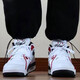 耐克（NIKE）篮球鞋男鞋2024春季新款运动鞋AIR FLIGHT 89简版AJ4休闲鞋板鞋 FD9928-101白红 40