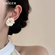 LnieerS925 silver needle camellia earrings for women 2025 new style versatile light luxury niche high-end earrings autumn and winter earrings camellia earrings S925 silver needle