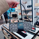 CoaCH (COACH) new NolitaBarrel pencil bag wrist bag official genuine CW809 IMXHE Maillard color printing