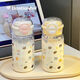 High-looking 2025 girls plastic cup summer water cup new portable double lid double drink cute student campus cup white dog 600ml