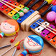 Triple Luolf Percussion Instrument Set Geschenkbox Kindergarten Frühbildung Aufklärungs Musikunterricht AIDS Spielzeug Schlagzeug Robe Drums Sand Hammer Cartoon Tiere 28 Stücke Lieferbox