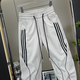 Pantalones de Harén casuales de rayas delgadas de verano de Fertisson Meng para hombres para niños para niños sueltos y modernos corbatas versátiles para hombres 683 Black + Off-White (2 tiras) 33 (recomendado 145-160Jin [Jin equivale a 0.5 kg])