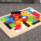 Yuan Family Holzpuzzle Kognitive Brettspielzeug Holzbriefe Geometrische Grafikbaustein Handgabetafel Holz Tetris 28*18 cm