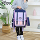 Disney's new primary school schoolbag for women, boys, grades 1-3456 British style shoulder protection and spine protection to reduce burden ultra light waterproof children 1047 taro purple recommended grades 2-6
