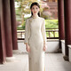 Kangmeishi bestickt mit langem modifiziertem Cheongsam 2025 Neue junge Frauen Retro Slim mittelgroße Ärmel