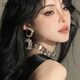 Boucles d'oreilles La rétro pour les femmes, style Hong Kong, conception de niche de luxe légère européenne et américaine, NOUVEAUX BOUCES DE CLIP DE PEUTS EAVEUR SIRGLE EXAGNÉE 925 Silver à aiguille-miaojiang (GA3527)