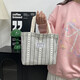Bolsos de trabajo para mujeres 2025 Nuevos bolsos de hombro de moda y de moda para mujeres Ins japoneses versátiles pequeños de hombro para mujeres y1663 beige rayas blancas