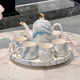 Light luxury high-end tea set 2025 new ceramic water cup teapot teacup home living room hospitality wedding gift warm yellow stone pattern dolphin tea set gift box set