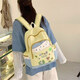 
Japanese cute ins style cat backpack niche high-value contrasting schoolbag junior high school girl breasts backpack yellow cartoon cat