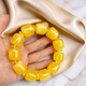 Giventy GEFIODEY natural Polish old beeswax bracelet men's original ore chicken oil yellow amber bracelet beeswax date beads yellow wax stone string about 22*28mm random original ore old yellow amber bracelet gift box