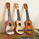 Children's toys can play ukulele toys simulated guitar enlightenment puzzle musical instrument music toys [Feihe] 44 cm ukulele-send music score