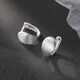 Xiangnan 999 sterling silver brushed earrings niche 2025 new earrings versatile high-end girl gift temperament earrings 999 silver brushed curved earrings (pair)