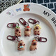 Mignon Kapibala Keychain Pendant Student Schoolbag Cartoon Hanging Ornement Girl Accessoires Accessoires pour le meilleur ami 3 forfaits (modèle aléatoire)