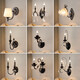 Les Lighting (NVC) 2025 latest French retro crystal wall lamp bedroom bedside living room background wall stairs atmosphere decorative light DM-6173 black single head