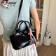 Woodpecker summer handheld black bag for women 2025 new trendy Korean female college student bucket bag simple versatile crossbody bag white follow the store for free