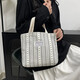 Bolsos de trabajo para mujeres 2025 Nuevos bolsos de hombro de moda y de moda para mujeres Ins japoneses versátiles pequeños de hombro para mujeres y1663 beige rayas blancas