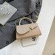 Brillante 2025 Nuevo bolso de diseño de nicho de moda, versátil y de alta gama para la bolsa cruzada de hombro de mujeres Bag Square Gold