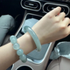 Menbin Lao Fenghuang Gold Store Ice Nuo Jade Jade Bracelet White Moonlight Jade Bracelet Glowing Green Girl Jadeite Lao Fengxiang Bing Nuo 8mm to gather wealth in the Year of the Snake Lao Fengxiang 56 ring mouth suitable for 90-106 Jin Jin is equal to 0.5 kg