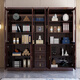 Hexi new Chinese style ebony solid wood bookcase glass door floor-standing integrated storage cabinet living room storage display cabinet shelf ebony wood three-door bookcase