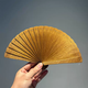 Yusenyi golden nanmu fan gloomy wood fan full of water waves ancient style summer fragrant wood fan Chinese style mini folding fan portable 16cm red oil cloud pattern 882 one thing one shot daily use fan