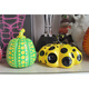 Yayoi Kusama pumpkin ornament sculpture with dense polka dots, yellow background and black dots 10x12 without label