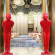 Welcome red figure sculpture bowing fiberglass ornaments hotel restaurant KTV doll decorations decorations on both sides of the hands (white on top and red on the bottom)