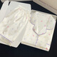 Ice Seiden-Pyjamas für Frauen in Sommerdünn-Ins-Stil, kurzärmelige Shorts-Buchstaben.