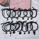 Sarara Gummibandpaar süßer Anhänger schwarzer Leder Cover Little Vorfahr Gummistband-Paar Armband für Freund SN6628 7-teiliger Set (wie im Bild gezeigt)