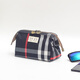 Yu Fengyue cosmetic bag small portable waterproof belongings storage bag bag Internet celebrity ins new large capacity female trend black plaid
