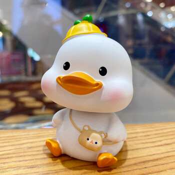 创意可爱治愈摇头小黄鸭电动汽车载装饰小摆件办公室桌面公仔a款白色