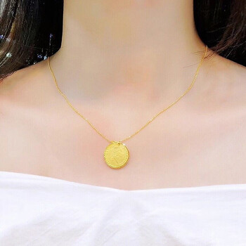 999足金女王牌吊坠金重约1