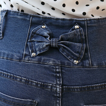 大鹏鸟依族dpnyz 2014秋冬新款排扣高腰蝴蝶结牛仔裤女 长裤 小脚裤