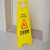 正在清洁小心地滑警示牌a字卫生间提示标识指示牌打扫清扫进行中 电梯检修中暂停使用