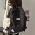 卡特骆（KATELUO）书包女大学生小众设计感泡泡格日系甜美少女系双肩包休闲包中学生 黑色+小白熊挂件