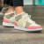 耐克（NIKE）篮球鞋女鞋春夏季Air Jordan 1运动鞋AJ1轻便透气时尚休闲鞋板鞋 DJ0338-100/粉白棕 37.5