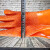 12双批塑胶止滑乳胶劳保手套耐磨防滑防水耐酸碱工业手套 12双橘色颗粒手套 XL