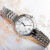 天梭（TISSOT）瑞士手表弗拉明戈系列时尚石英女表 白色贝母盘钢带 送女友礼物