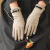 MISMEMO羊毛手套女秋冬季薄款中长护手腕冬天开车可触屏分指手套 皮粉色（单层薄款） 均码