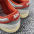 耐克（NIKE）Dunk Low 红白色女子复古舒适潮流低帮潮流经典休闲运动板鞋 FJ5429-133白灰橙 38