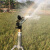 喷水洒水器喷淋喷头360度自动旋转草坪园林农用绿化喷灌浇水灌溉 1.5寸铜摇臂喷枪+1.2米三 脚架