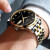 冠琴（GUANQIN）手表男机械表全自动时尚镂空飞轮男士瑞士品质商务双日历防水男表 钢带间金黑面