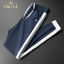 OKOJ品牌薄款冰丝运动裤男夏季休闲裤男潮流撞色丝滑修身束脚简约绿色男士运动长裤 蓝色 29