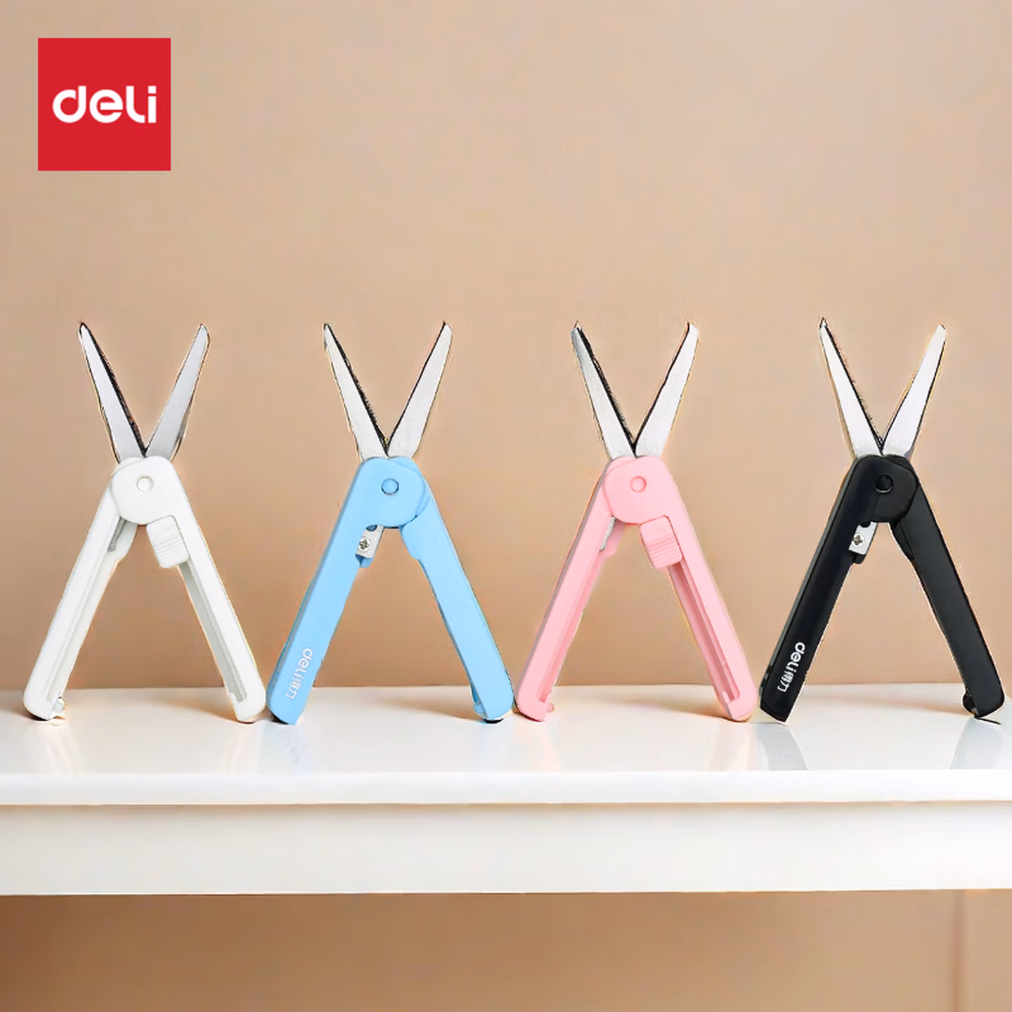 得力(deli)迷你便携式开箱剪刀 创意功能  推拉结构 秒变美工刀 混色607