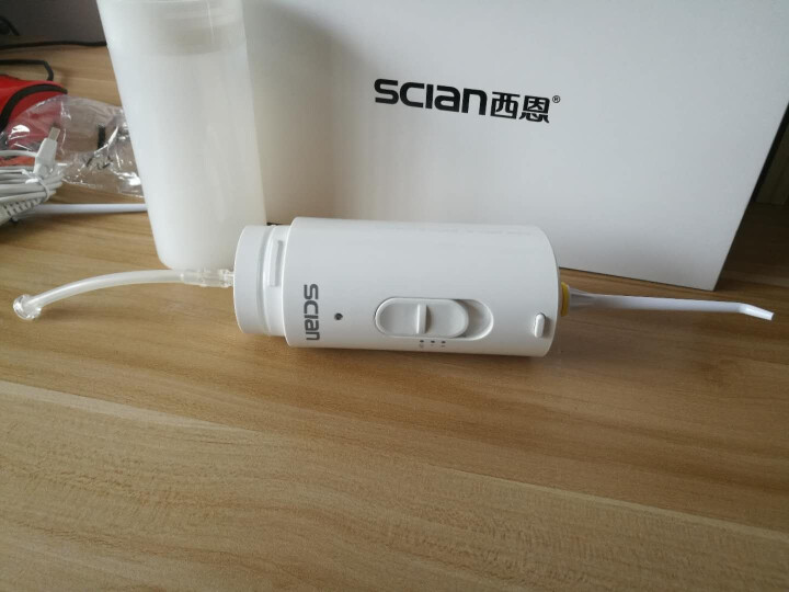 西恩（scian）便携式冲牙器/洗牙器/水牙线/洁牙器非电动牙刷口腔护理牙垢烟渍清洁器正畸牙齿美白 白色礼品装怎么样，好用吗，口碑，心得，评价，试用报告,第8张