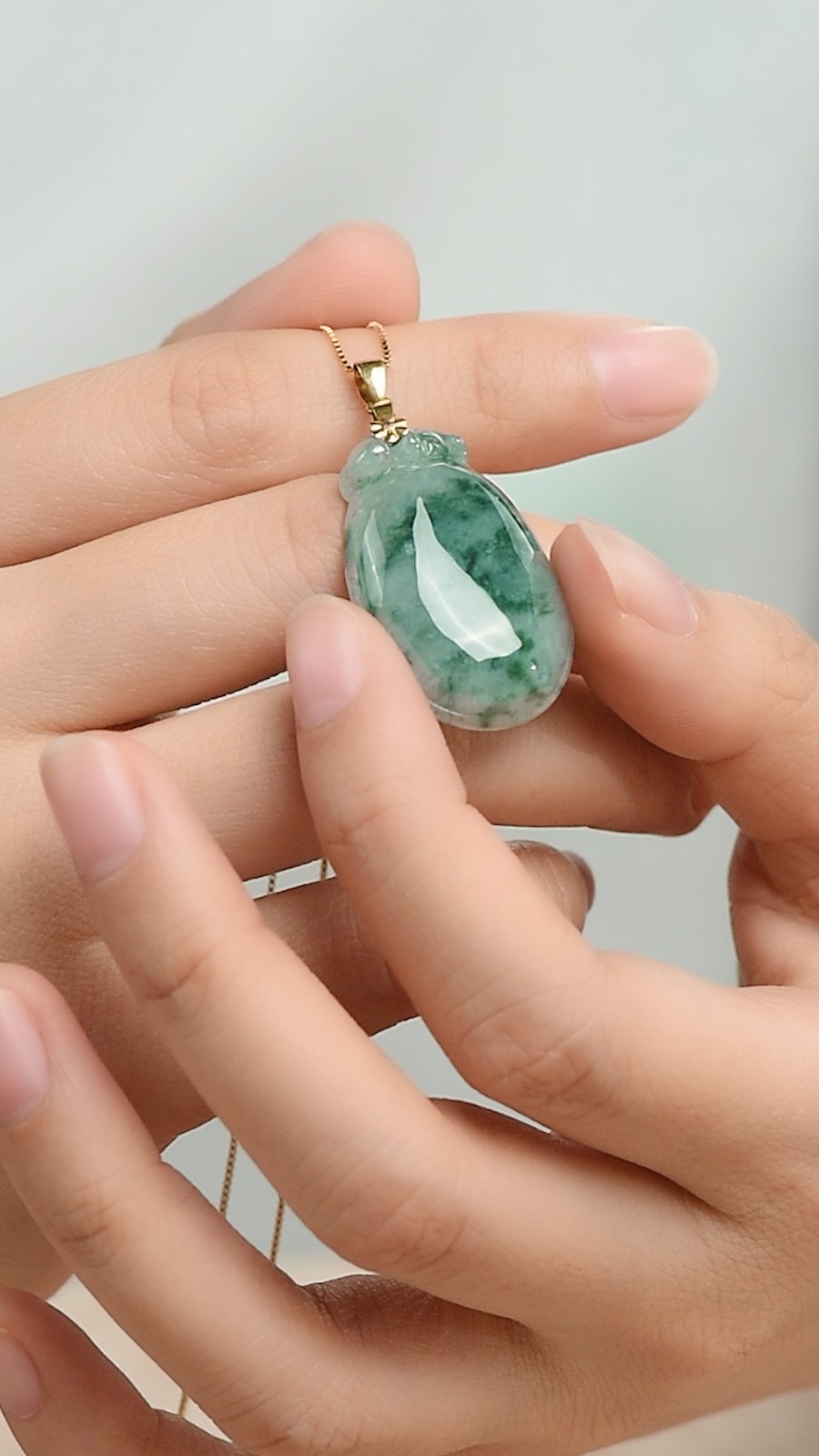 凤禧18k金镶翡翠飘花福瓜吊坠